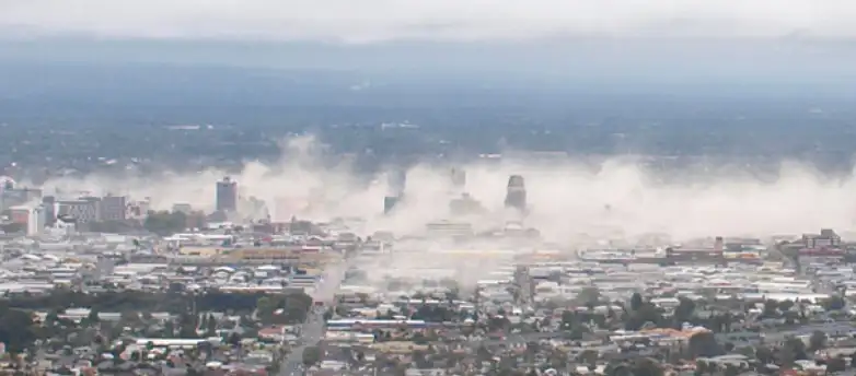 Dust rising over Christchurch following the 2011 earthquake